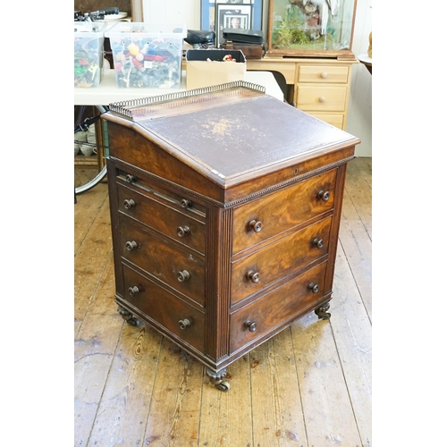 696 - A Regency Mahogany Sliding Top Davenport fitted with a single side swing drawer with a Brass Rail, M... 