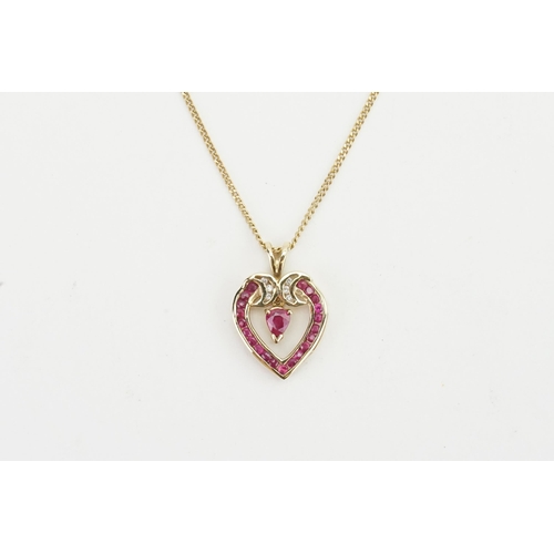 189 - A 9ct Gold Ruby set heart pendant, hung on a 9ct Gold chain. Weight 3.4g.