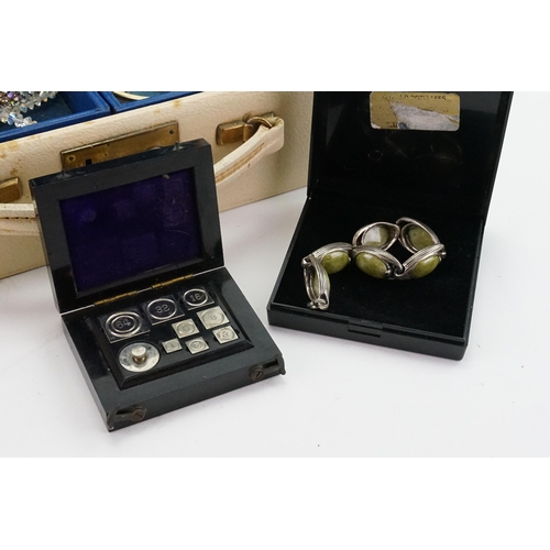 316 - A collection of costume jewellery, contained in a jewellery box, to include silver, cameos etc.