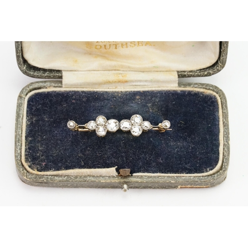 137 - A beautiful old cut Diamond set brooch, set with 10 old cut diamonds. Largest approximately 0.25ct. ... 