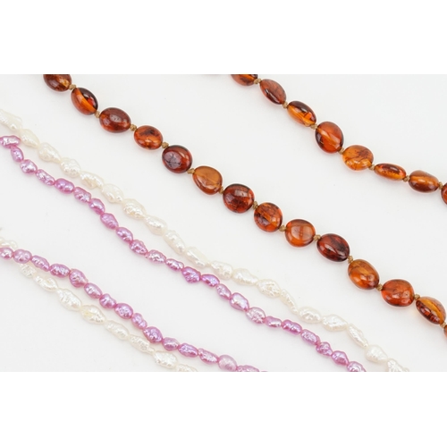 138 - A amber style bead necklace, along with a 9ct gold clasp pearl necklace.