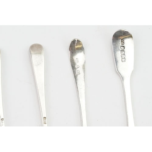 12 - Six Georgian silver spoons, along with a Victorian spoon. Weight 86g.