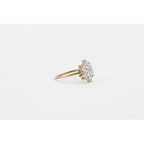 145 - A floral design 9ct gold diamond set ring. Weight 3g. Size T.