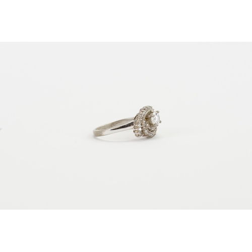 149 - A 9ct white gold paste set ring. Size T. Weight 4.8g.