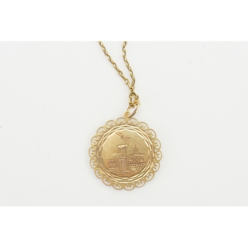 162 - A gold Greek style pendant on chain. Weight 9.7g