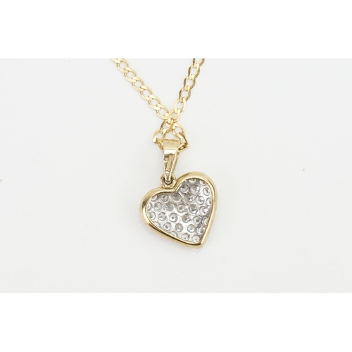 167 - A 9ct gold love heart pendant with paste stones, hung on a 9ct chain. Weight 8g.