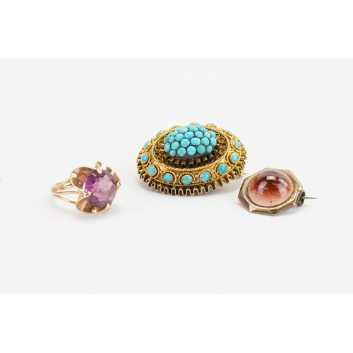 179 - A amethyst set ring, along with a brooch and a turquoise mounted brooch.