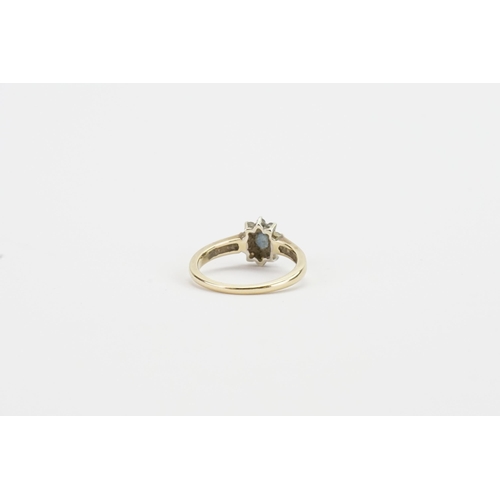 226 - A 9ct gold moissanite and sapphire set ring. Weight 2.6g. Size N.