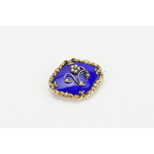 231 - A 9ct gold blue enamelled and pearl set mourning brooch. Weight 10g. Measures 3.5cm x 2.9cm.