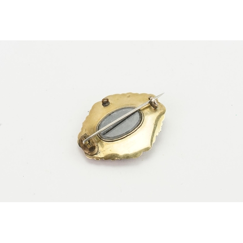 231 - A 9ct gold blue enamelled and pearl set mourning brooch. Weight 10g. Measures 3.5cm x 2.9cm.