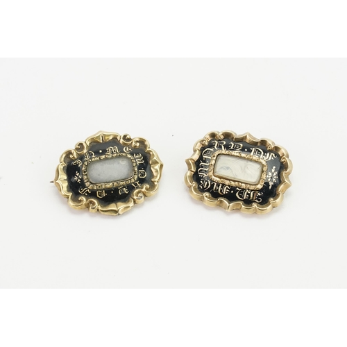 232 - A pair of 9ct gold onyx set mourning brooches. Weight 14.3g.