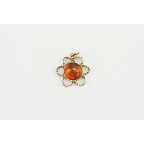 220 - A 14ct gold amber set pendant, marked EF 585. Weight 2.3g.