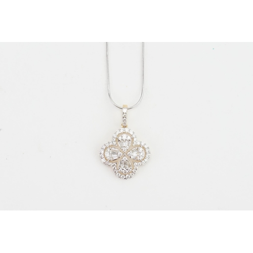 214 - A 9ct gold paste set necklace in the floral design. Weight 3g.