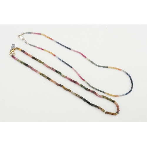 215 - A sapphire set multicoloured necklace, along with a tourmaline multicoloured necklace.