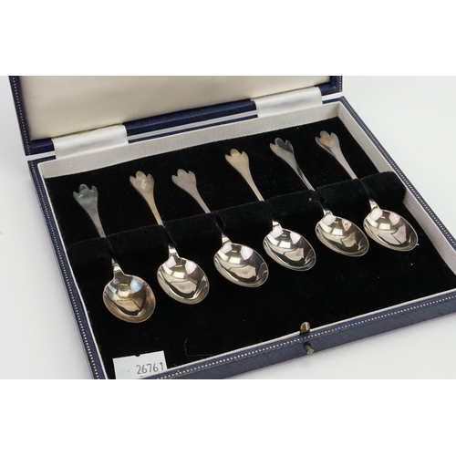 19 - A Francis Howard set of 6 silver cased tea spoons. Weight 55.3g.