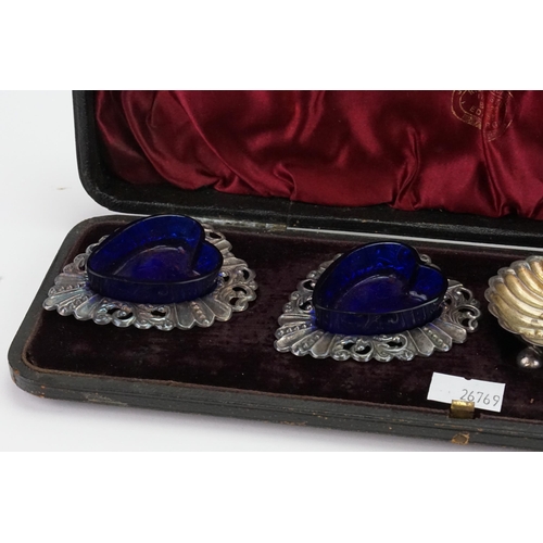 27 - A James Deakin & Sons 1893 silver cased set with shell and love heart design. Weight 51.g.