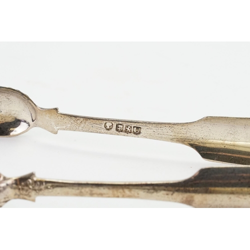 48 - A Victorian 1839 Muir Head & Arthur silver sugar tongs. Weight 40g. Along with a silver and mother o... 