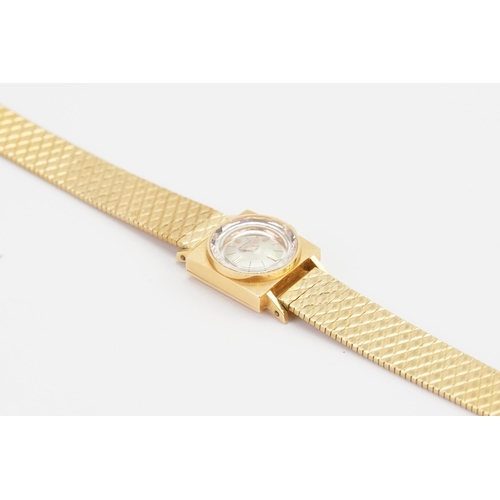 356 - A ladies Universal Geneve 18ct gold square ladies watch. Silver and rose gold dial, 17 jewel univers... 