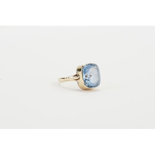 196 - A 9ct gold aquamarine ring, set with an emerald cut aquamarine approximately 11.5mm x 13.4mm, depth ... 