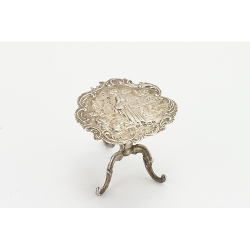 71 - A 1896 Samual Boyce Landeck silver miniature table. Weight 16.2g.