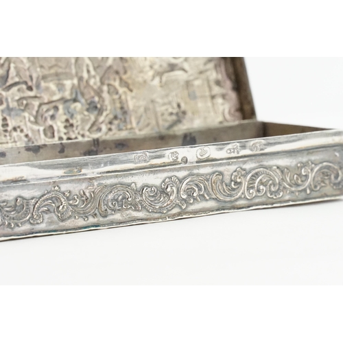 74 - A 1894 Victorian silver embossed pot, embossed with cherubs. Weight 109g. 12.5cm x 4.3cm.