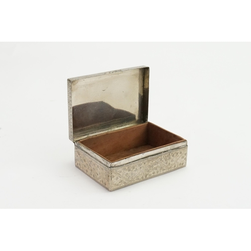 76 - A silver coloured white metal enamelled cigar box.