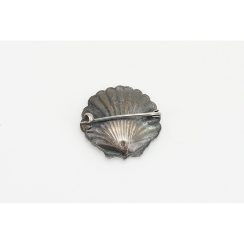 273 - A Bernard Instone vintage Imp shell brooch.