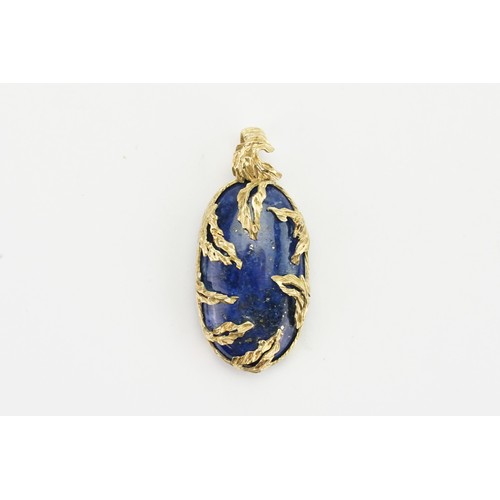 176 - A Lapis Lazuli pendant, mounted in Gold (test as a high carat). 

An High Carat gold mounted lapis l... 