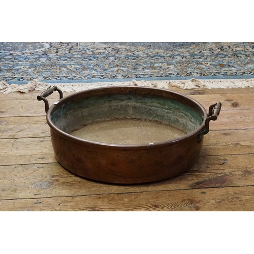 979 - A Regency Copper Two Handled Jam Pan. Measuring: 43cms across.