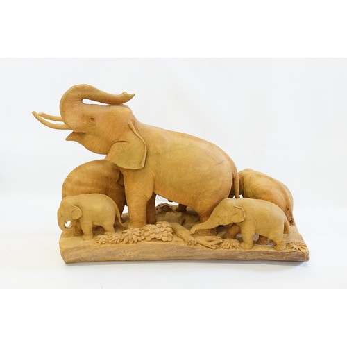 992 - A Large Carved Hardwood Study of a Female Elephant with her young. Measuring: 56cms long x 41cms hig... 