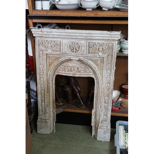 970 - A Victorian Revival Cast Iron Bedroom Fire Place decorated with flowers & swags. Measuring: 66cms ac... 