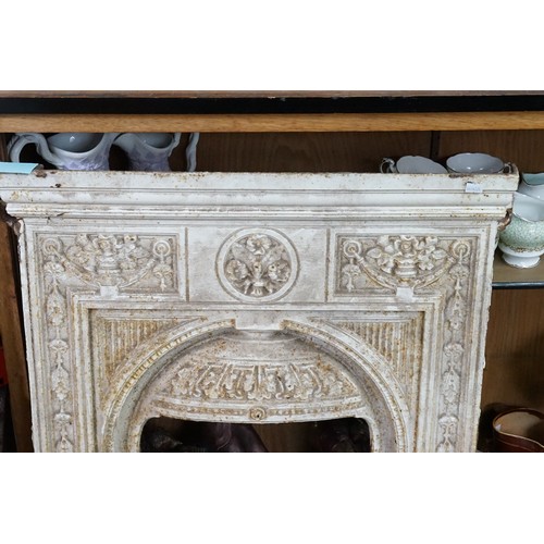 970 - A Victorian Revival Cast Iron Bedroom Fire Place decorated with flowers & swags. Measuring: 66cms ac... 