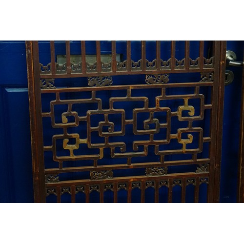 426 - A Pair of Chinese Hardwood & Pierced decorated Screens. Measuring: 60cms x 163cms.