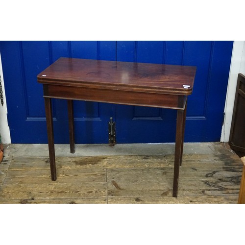 698 - A Flame veneered Georgian Fold-Over Top Card Table resting on square legs. Measuring: 91cms across x... 