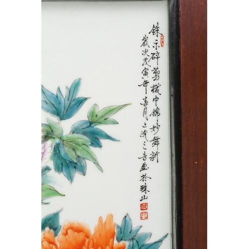 440 - A Chinese Painted on Porcelain Plaque decorated with dahlias & Butterflies with a scripted Character... 