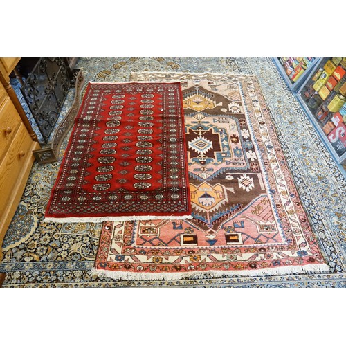 730 - An All-Over Pink Ground Single bordered Persian Carpet with a central medallion, arrow head design, ... 