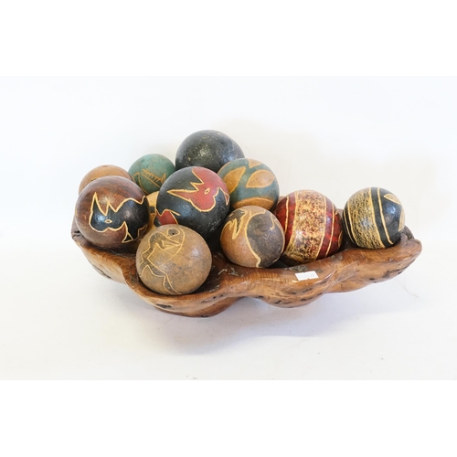 529 - A Collection of Antique Wooden Balls along with a Vintage Wooden Bowl.