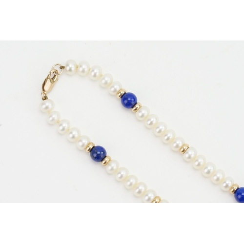 82 - A 9ct Gold Pearl and Lapis Set Necklace. Length: 47cms.