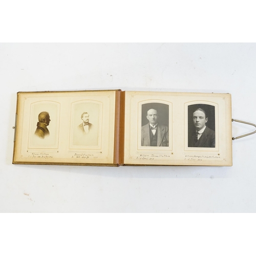 410 - A Photograph Album containing Victorian Photographs of the Clutton Family.