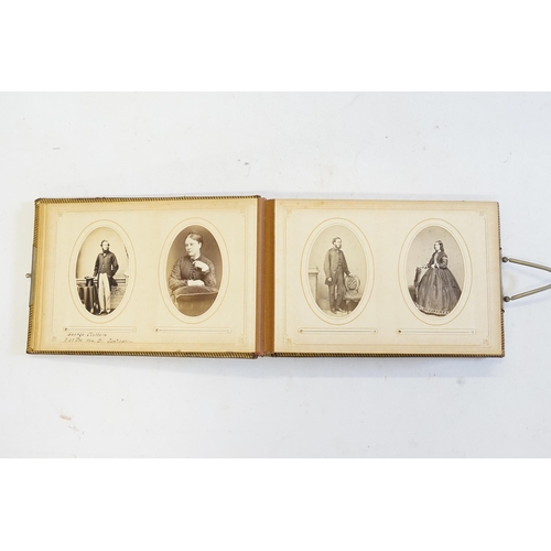 410 - A Photograph Album containing Victorian Photographs of the Clutton Family.