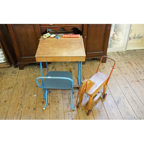 415 - A 1950s Childs Desk on Blue Painted Stand & a Chair along with a 1950s Childs Roll a long Horse with... 