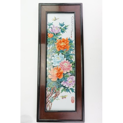 508 - A Chinese Painted on Porcelain Plaque decorated with dahlias & Butterflies with a scripted Character... 