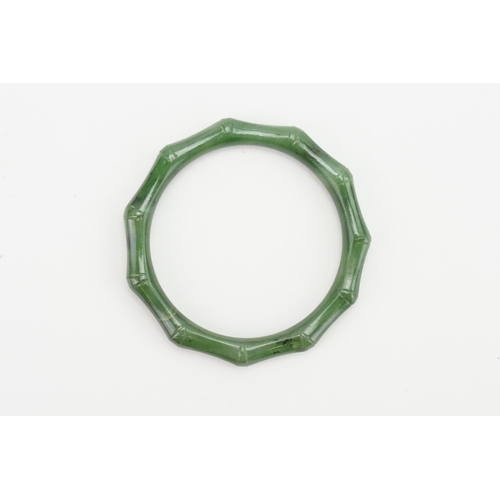 97 - An Apple Jade Colour Bangle in the Bamboo Style. Weight: 34 grams.