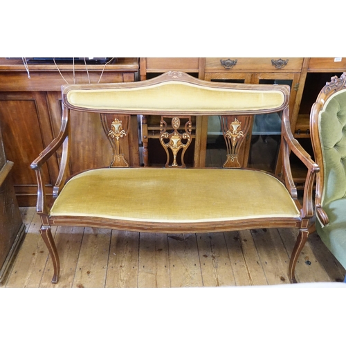 445 - A Late 19th Century inlaid Two Seater Drawing Room Settee resting on swept out legs & Upholstered in... 