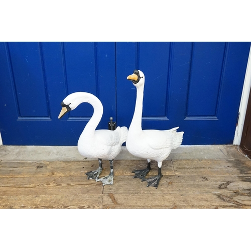 701 - A Pair of Cast Metal Swan Ornaments painted on White & Black.