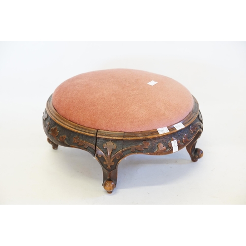 436 - A Victorian Foot Stool in Carved Walnut decorated in the Irish Taste.