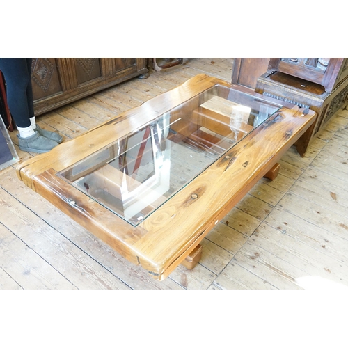 450 - A Japanese designed Low Down Ceremonial Tea Table with a Glass Top. Measuring: 153cms across x 89cms... 