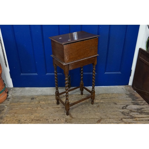 452 - A Reproduction Oak Bible Box resting on Barley Twist Legs. Measuring: 27cms x 42cms x 86cms.