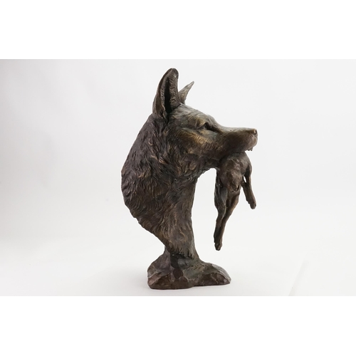 713 - An interesting study of a Fox's Head in it's jaws a Rabbit, Signed A.P. Tit. Measuring: 41cms High.