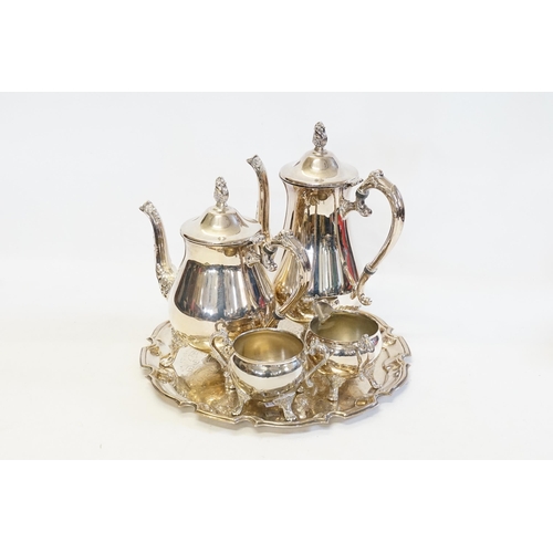61 - A Four Piece Silver Plated Tea Set on a Tray.